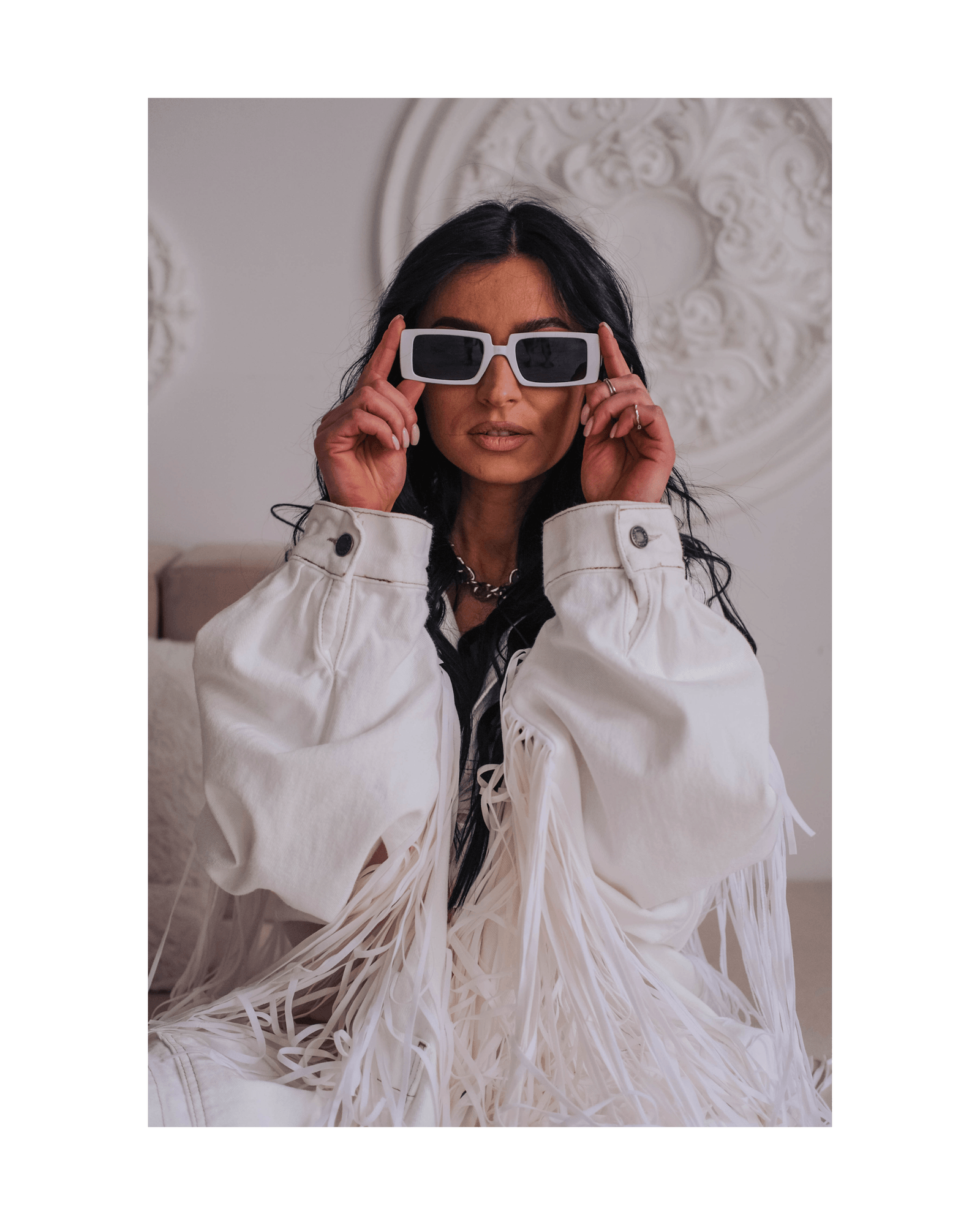Fashion creator wearing modern sunglasses